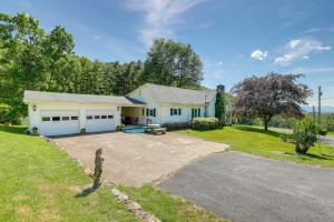 a white house with a driveway in front of it at Mtn Views and Epic Sunsets Private Weaverville Home in Weaverville