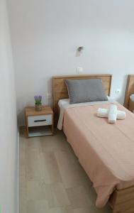 Posteľ alebo postele v izbe v ubytovaní Hermes Comfort