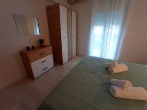 Posteľ alebo postele v izbe v ubytovaní Hermes Comfort