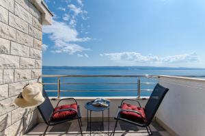 A balcony or terrace at Apartments Liana - VaLa