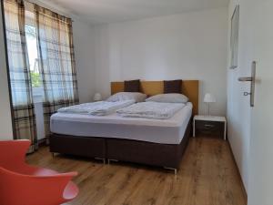Ένα ή περισσότερα κρεβάτια σε δωμάτιο στο Landhaus Sandra