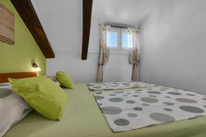 Postel nebo postele na pokoji v ubytování APARTMENT LANTERNA