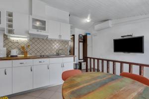 Kuchyňa alebo kuchynka v ubytovaní APARTMENT LANTERNA