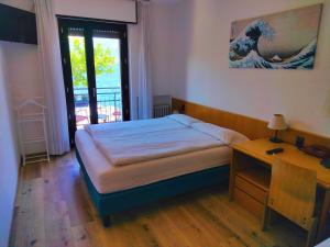 Posteľ alebo postele v izbe v ubytovaní Hotel S.Maria