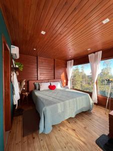 Postel nebo postele na pokoji v ubytování Cabanas Românticas em meio a Natureza - Anitápolis/SC - CB05