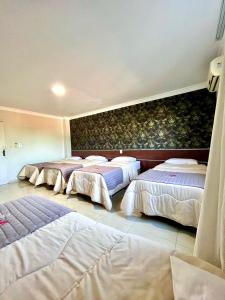 Postel nebo postele na pokoji v ubytování Hotel Fenice