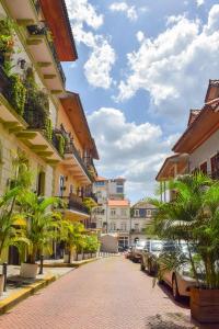 a cobblestone street in a town with buildings at Best location - Luxury and charming loft in Panama City