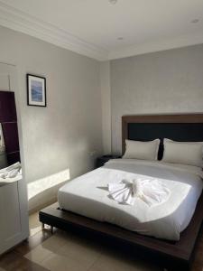 AMWAJ HOTEL客房内的一张或多张床位