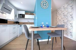 Η κουζίνα ή μικρή κουζίνα στο Le Grand Large-Appart proche mer avec terrasse +10 φωτογραφίες