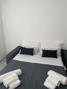 Łóżko lub łóżka w pokoju w obiekcie Maison 115