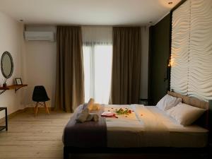 Postel nebo postele na pokoji v ubytování Hotel Koferita