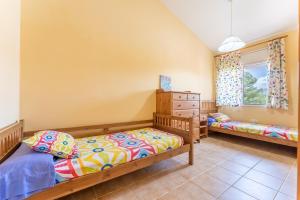 Posteľ alebo postele v izbe v ubytovaní Miami Platja Casa LOGA + 32 fotografií