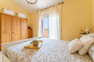 Posteľ alebo postele v izbe v ubytovaní Miami Platja Casa LOGA