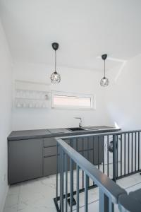 Kuchyň nebo kuchyňský kout v ubytování Holidayhouse Duje 4+1 rooftop terrace seaview