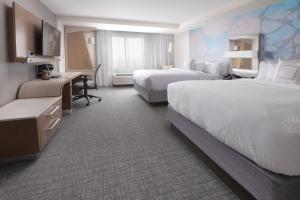 Postel nebo postele na pokoji v ubytování Courtyard by Marriott Austin Pflugerville