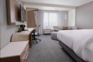 Postel nebo postele na pokoji v ubytování Courtyard by Marriott Austin Pflugerville