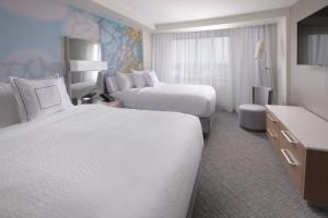 Postel nebo postele na pokoji v ubytování Courtyard by Marriott Austin Pflugerville