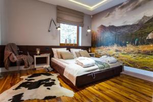 Posteľ alebo postele v izbe v ubytovaní Apart-Center Zakopiańskie Tarasy SPA