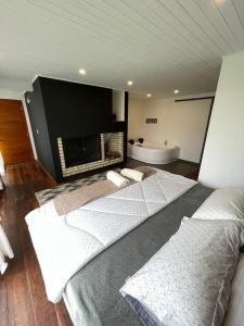 Postel nebo postele na pokoji v ubytování Suite campestre en Guatavita