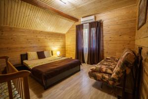 Posteľ alebo postele v izbe v ubytovaní Dacha 9