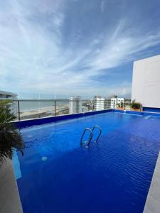 a swimming pool on top of a building at Wyndham Garden Cartagena in Cartagena de Indias