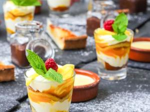 a group of desserts in glasses on a table at Novotel Marseille Est Porte d'Aubagne in Marseille