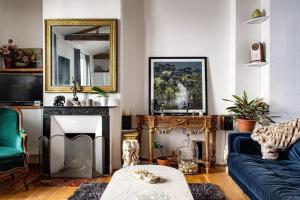 Et opholdsområde på Appartement type loft - 40m² Marais + 8 billeder