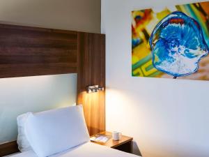 Postel nebo postele na pokoji v ubytování Mercure St Helens