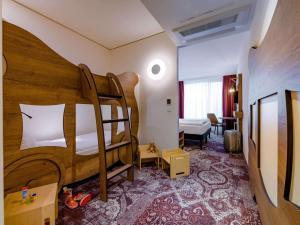 Postel nebo postele na pokoji v ubytování ibis Styles Coburg