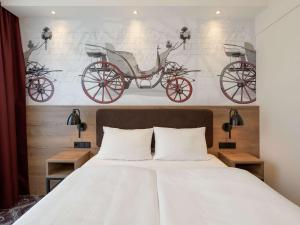 Postel nebo postele na pokoji v ubytování ibis Styles Coburg + 37 fotografií