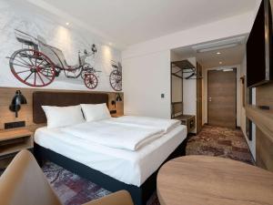 Postel nebo postele na pokoji v ubytování ibis Styles Coburg