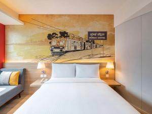 Postel nebo postele na pokoji v ubytování ibis Mumbai Vikhroli - An Accor Brand