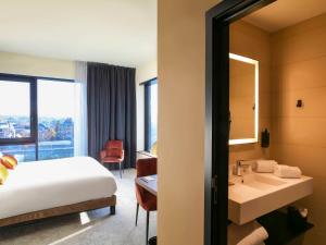Mercure Namur Hotel客房内的一张或多张床位