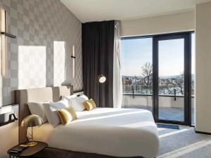Mercure Namur Hotel客房内的一张或多张床位