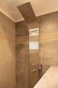 A bathroom at The 50/50 Luxury Apartments
