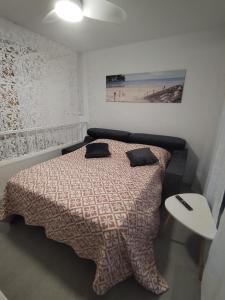 Postel nebo postele na pokoji v ubytování Estudio Ana de Monaco La Manga