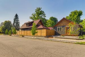 a house on the side of a road at Cozy Coeur dAlene Studio, Walk to Downtown and Lake in Coeur d'Alene