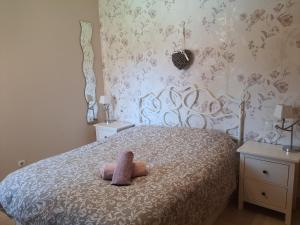 Katil atau katil-katil dalam bilik di Magnifico chalet con piscina privada