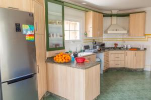 a kitchen with a counter with oranges on it at Casa Valentina in Jávea