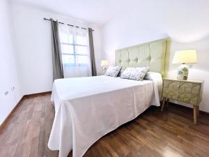Posteľ alebo postele v izbe v ubytovaní FTV Holidays Homes