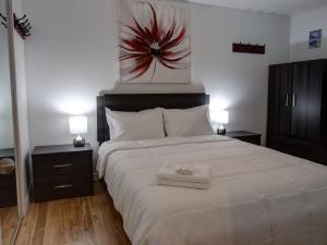 Кровать или кровати в номере Logis des prodiges