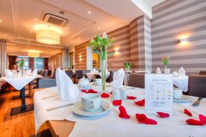 Restoran või mõni muu söögikoht majutusasutuses Relexa Hotel Bellevue an der Alster