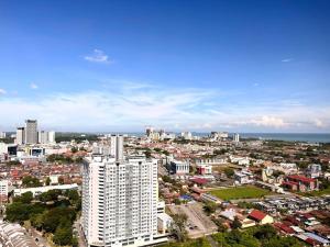 an aerial view of a city with buildings at Urban Vista @ The Quartz Residence: City Center Retreat with InfinityPool in Melaka
