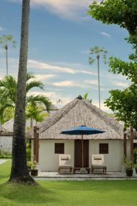 Zahrada ubytování Jimbaran Puri, A Belmond Hotel, Bali