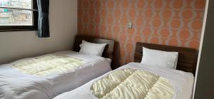 Postel nebo postele na pokoji v ubytování World Business Hotel