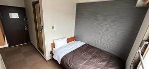 Postel nebo postele na pokoji v ubytování World Business Hotel + 8 fotografií