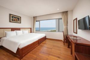 Postelja oz. postelje v sobi nastanitve Sekong Hotel Da Nang