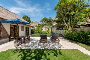Zahrada ubytování Jimbaran Puri, A Belmond Hotel, Bali