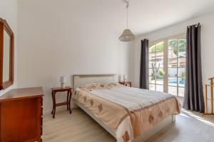 Ένα ή περισσότερα κρεβάτια σε δωμάτιο στο Villa Brétignolles +19 φωτογραφίες