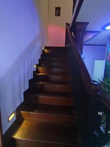 a set of stairs in a house with lights at SISILA BREAK THISSAWEWA in Anuradhapura